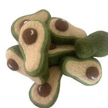 Load image into Gallery viewer, Avogatto Felted Wool Cat Toy
Meet the purrfectly ripe Avogatto—no peeling, no pit danger, just endless play. Each one is needle felted by hand from 100% wool, shaped into a plump little avocado that’s begging to be batted and chased. At about 4 inches long, 2.5 inches wide, and 2 inches thick, it’s sized just right for kitty paws to hug, kick, and carry. Infused with USA-grown organic catnip, the Avogatto tempts your cat with an irresistible scent that sparks playful energy and pure joy.