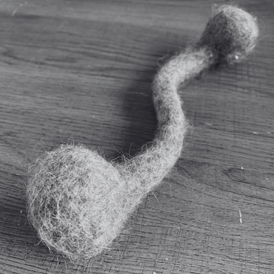 under the door wool cat toy